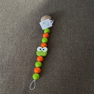 Green and Orange Frog Pacifier Clip